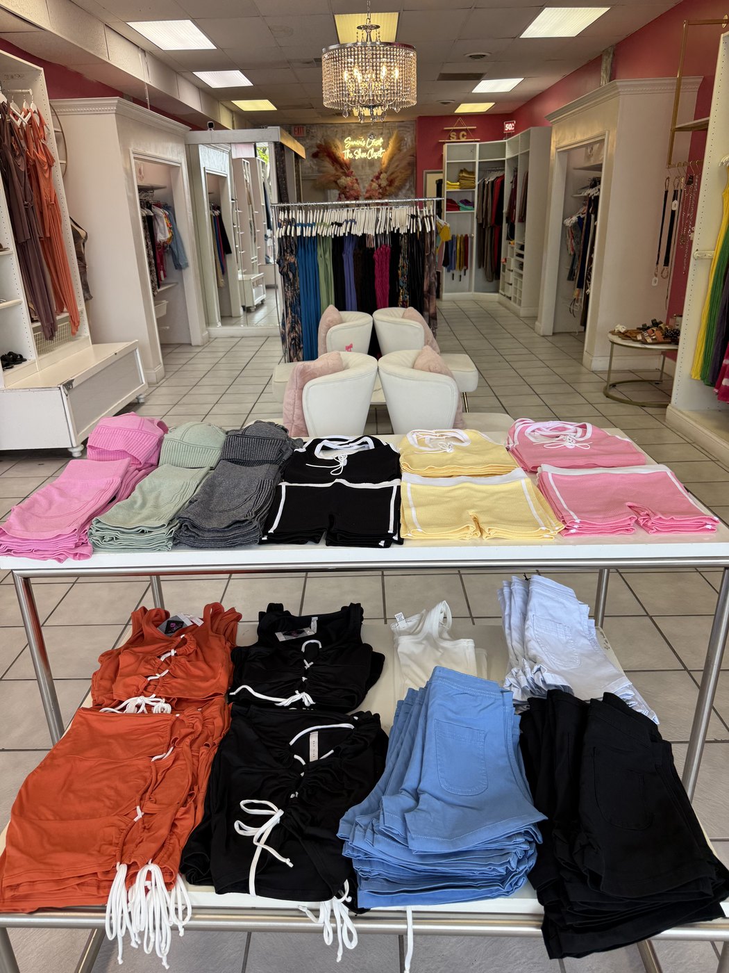 Inside Samira’s Closet boutique with clothing racks and displays